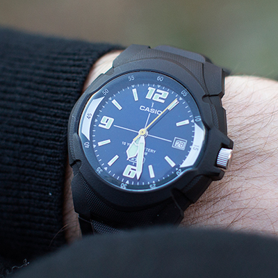 CASIO<sup>&reg;</sup> Men's 100M HD Series Sports Watch - This all black men's sports watch is water resistant to 100 meters.  Includes a 3-hand analog with date display, luminous dial and buckle clasp.